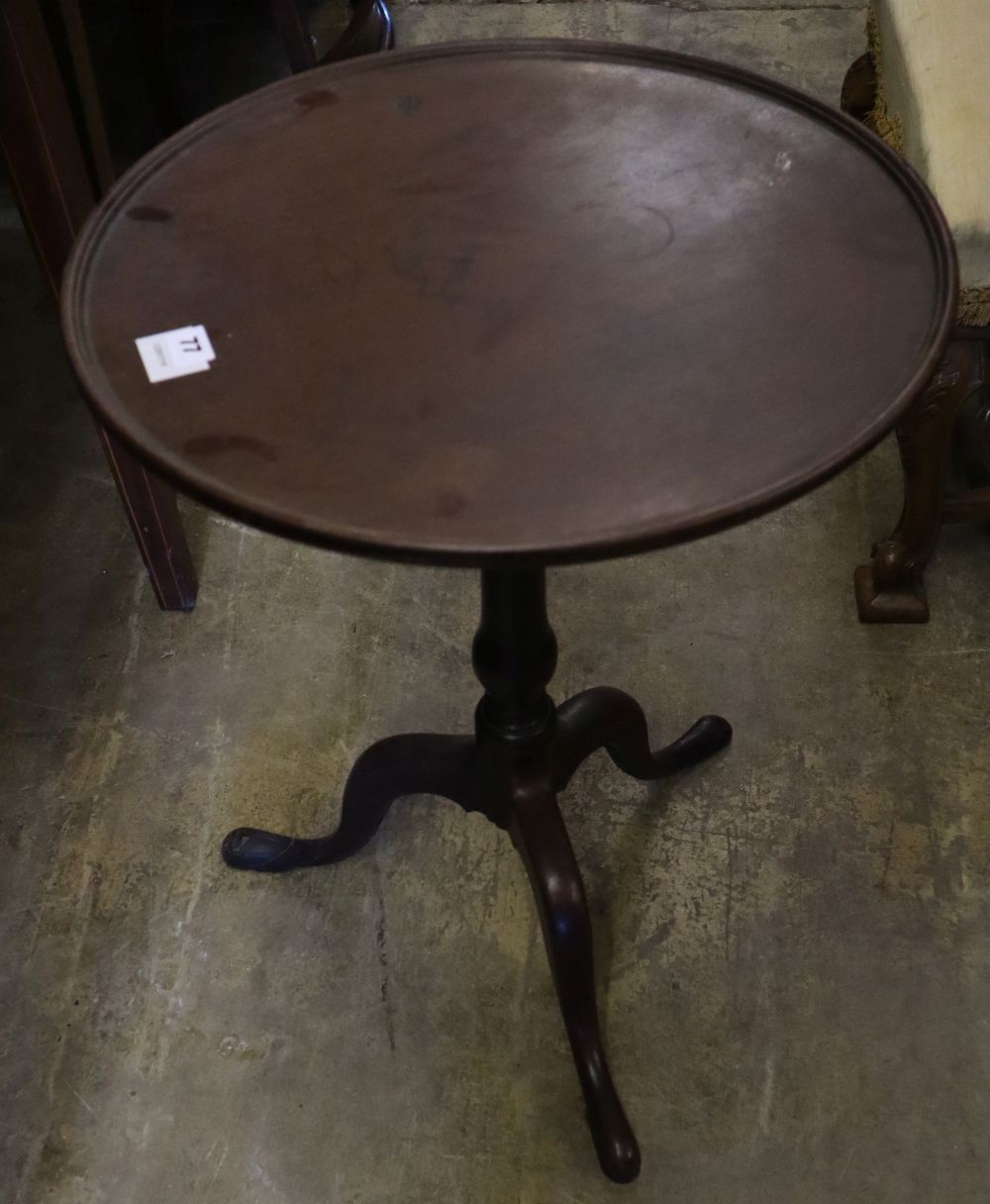 An early 19th century mahogany tripod table, with dished top, width 50cm